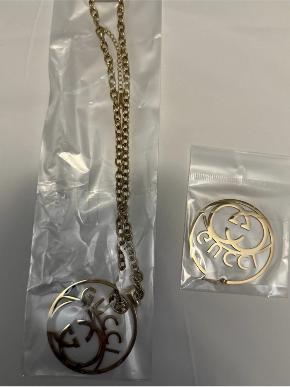 Gold-Tone Logo Pendant Necklace with Matching Hoop Earrings - Picture 2 of 2